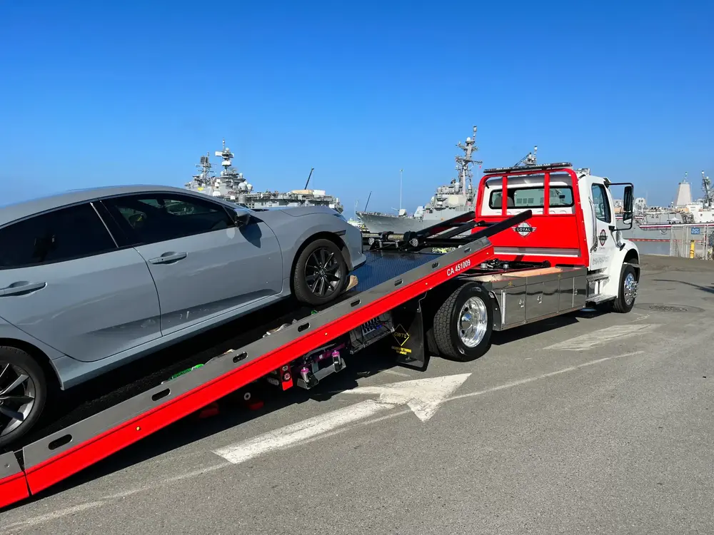 https://loyaltowingservices.com/wp-content/uploads/2025/01/picking-car-2-scaled-1-1.webp